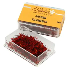 Boîte de safran en filaments Mielodie Gourmande. Découvrez comment utiliser le safran en filaments pour parfumer vos plats.